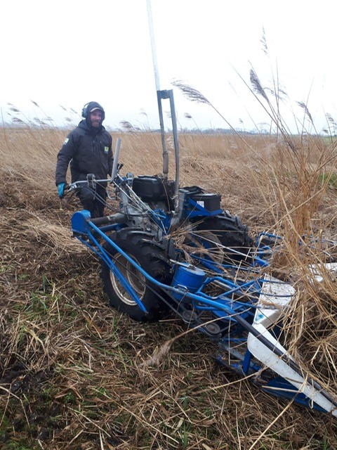 Landschap Noord-Holland machine aan het werk